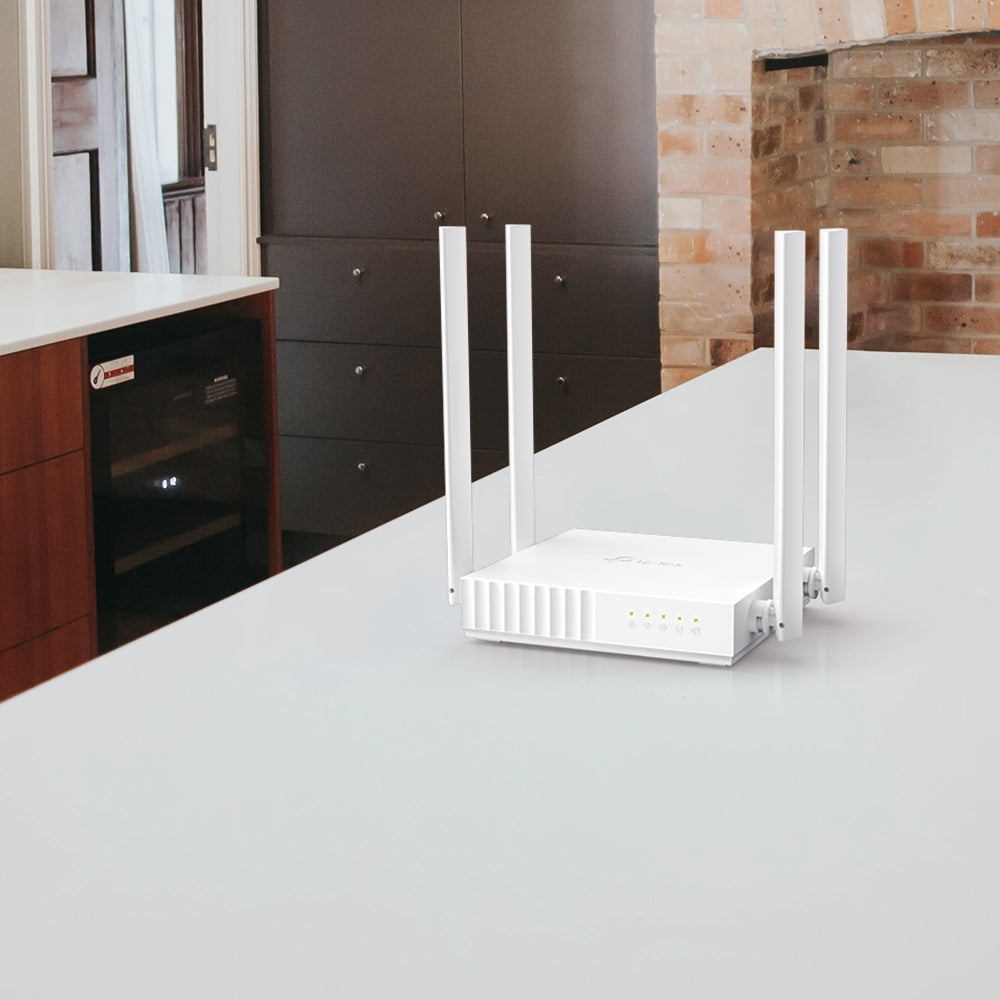 TP-Link Archer C24 AC750 Dual-Band Wi-Fi Router 4 เสาสัญญาณ เหมาะกับการสตรีมมิ่งวิดีโอความละเอียดสูงและความเร็วสูงในการดาวน์โหลด